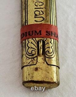 Tube de rouge à lèvres en laiton antique RARE de style pompéien Art Déco des années 1920, de l'époque des années folles, JAMAIS UTILISÉ.